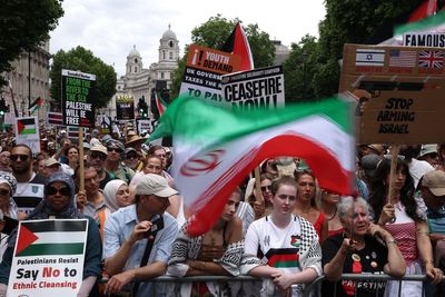 Eight arrested at pro-Palestine rally as thousands gather in over 30C heat