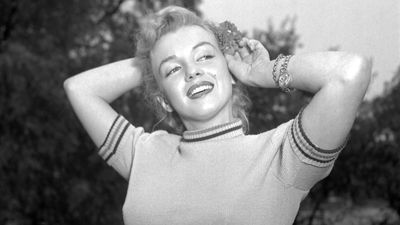 Privacy planting is an art in Marilyn Monroe's '50s front yard – perennial borders and perfectly pruned hedging keep it subtle but secluded