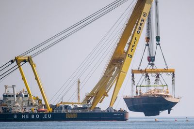 The recovered Bayesian superyacht transferred to Sicilian port on its final journey