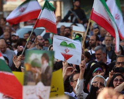 ‘We weren’t expecting it yet’: US attack met with panic in Iran