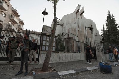 At least 13 killed after suicide bomb attack on busy church in Syria