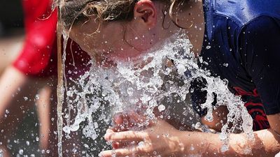 Tens of millions endure sweltering temperatures in the US as rare June heatwave continues