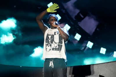 Young Thug performs for the first time since leaving jail, teams with Travis Scott and T.I.: Photos