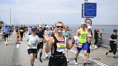 Some 40,000 runners cross Europe’s longest bridge and tunnel link on its 25th anniversary