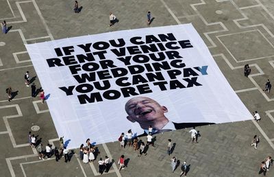 Inside the No Space for Bezos movement: ‘One man rents a city for three days? That’s obscene’
