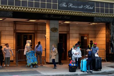 New York City closes arrival center for migrants in once grand Manhattan hotel