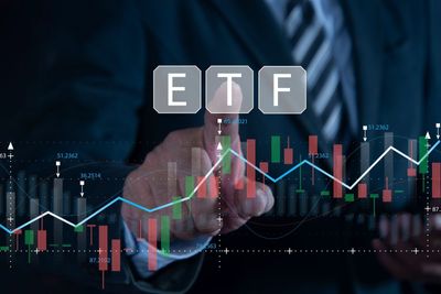 This New ETF Promises to Help You Invest Like Warren Buffett and Yields 15%
