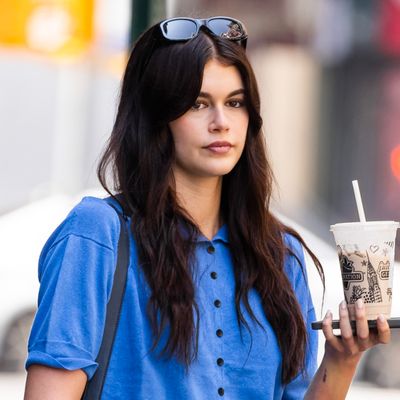 Kaia Gerber Embraces Summer's Most Unexpected Shoe Trend, in Moto Boots and Jean Shorts