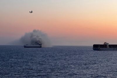 What led to a car carrier sinking in the North Pacific Ocean
