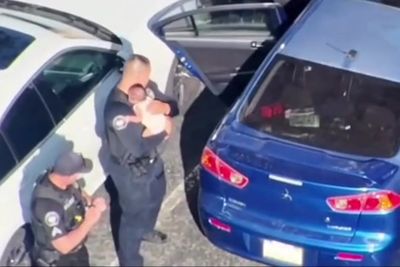 Watch: Police smash window to rescue baby locked in 110-degree car