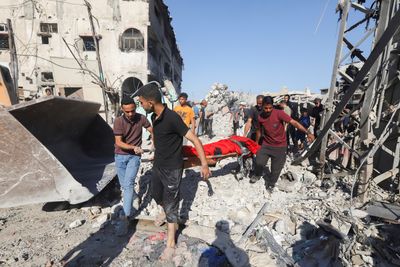 Israeli attacks kill at least 78 as Trump signals progress in Gaza talks