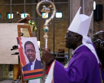Mourners left waiting as court orders halt to former Zambian president’s funeral