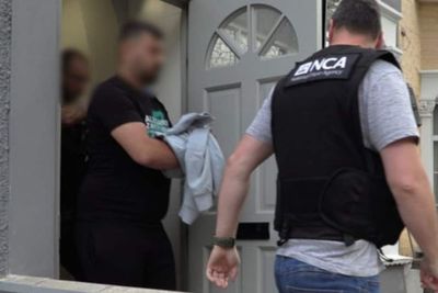 Inside London raids targeting ‘people smuggling gang' as four arrested