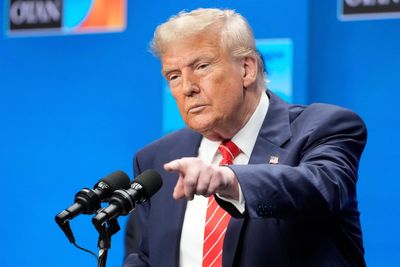The Latest: NATO leaders agree on spending hike, vow to defend each other