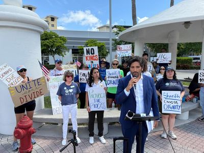 Protesters rally at US sheriffs meeting to oppose partnerships with immigration authorities