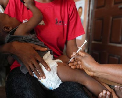 Scientists criticise cut in UK funding for global vaccination group