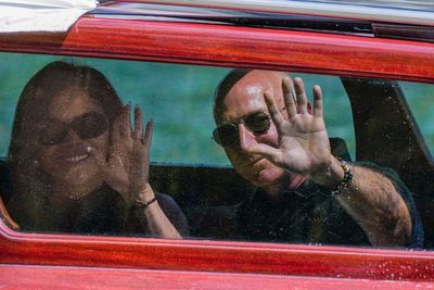 Protests continue as celebrities arrive for Jeff Bezos’ lavish wedding