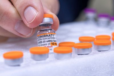 FDA requires updated warning about rare heart risk with COVID shots