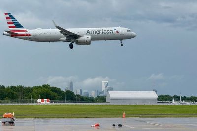 American Airlines flight forced to turn around as witnesses see ‘flames and smoke’ coming from the plane