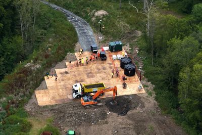 Operation to clean up 30,000 tonnes of waste dumped in woods gets under way