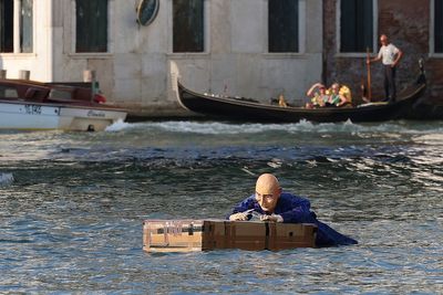 Jeff Bezos mannequin floats in Venice canal in wedding protest