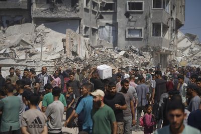Israeli attacks kill 62 Palestinians in Gaza, including three near aid site