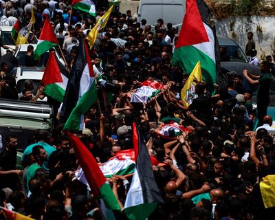 ‘They attack us without provocation’: West Bank town mourns its dead after settler raid