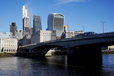 FTSE up as pound hits near four-year high