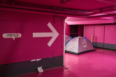 Photos of Israel's underground parking lots and subways became bomb shelters amid war with Iran