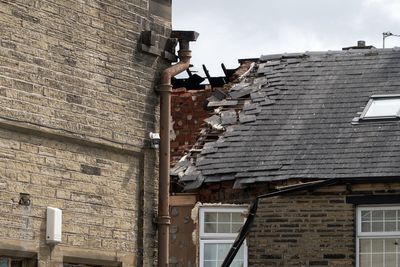 Halifax home ablaze following huge explosion with three injured