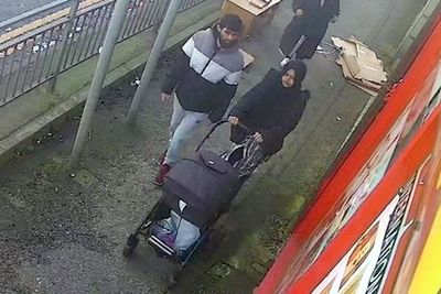 Man seen on CCTV calmly walking in city after killing wife as she pushed pram