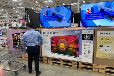 Key inflation gauge rose last month while Americans cut back on spending