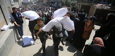 Chaotic new aid system means getting food in Gaza has become a matter of life – and often death