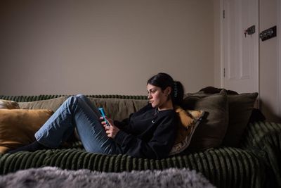 ‘I don’t think my brain should have gone through that’: five young people on their experience of smartphones as teens