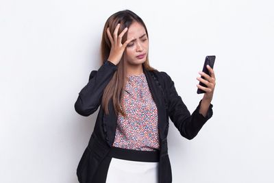 Why Adult Children Dread Phone Calls From Their Parents