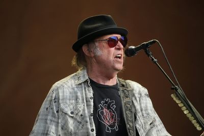 Neil Young’s Glastonbury headline set to be broadcast live on BBC after U-turn