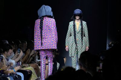 Rei Kawakubo redefines men's suits with radical designs at Paris Fashion Week