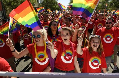 Photos: Big brands are pulling out of Pride. Here's how their involvement has changed over the years
