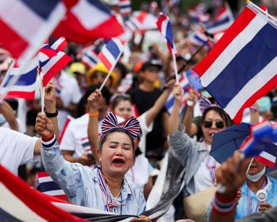 Protesters in Bangkok demand resignation of prime minister over leaked phone call