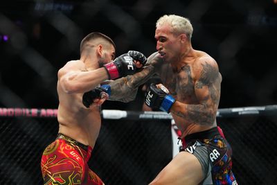 Topuria KO’s Oliveira to win lightweight title at UFC 317