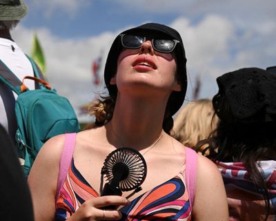 Festivalgoers fight to keep cool as 30C heatwave hits Glastonbury