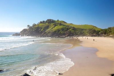Teenage boy mauled by shark at popular beach as he’s rushed to hospital with ‘serious’ arm injuries