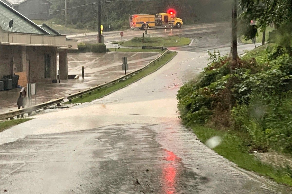 Thousands of motorists stranded for up to eight hours after heavy rains trigger mudslides in West Virginia