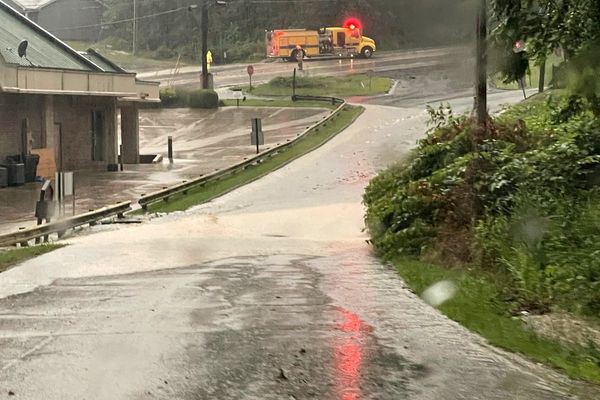 Thousands of motorists stranded for up to eight hours after heavy rains trigger mudslides in West Virginia