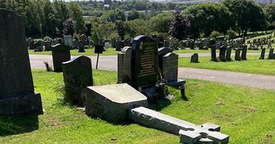 Man charged after crucifix set alight and headstones damaged in cemetery attack
