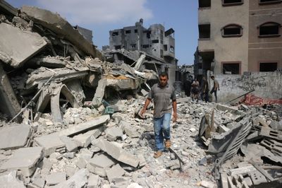 Gaza Rescuers Say Israeli Forces Kill 48 As Ceasefire Calls Mount