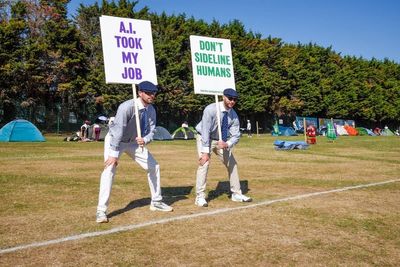 Uniformed protesters criticise introduction of AI line calls at Wimbledon