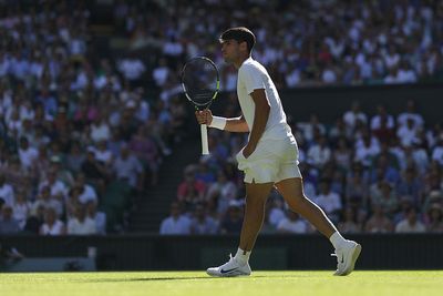 Carlos Alcaraz scrapes to first round win at Wimbledon