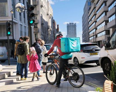 UK food delivery firms step up checks after claims of illegal workers