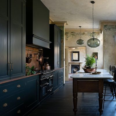 These are the best paint finishes for dark colours in a kitchen, according to experts – hide fingerprints by picking a practical finish